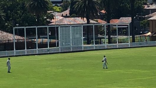 David Warner walks from the field