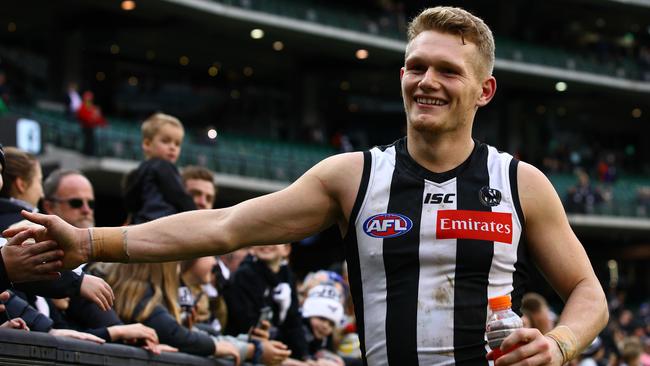 Adam Treloar is flying for the Magpies. Pictures: AFL Photos/Getty Images