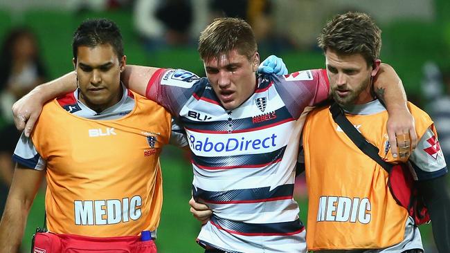 MELBOURNE, AUSTRALIA — MAY 02: Sean McMahon of the Rebels leaves the field with an injury during the round 12 Super Rugby match between the Rebels and the Chiefs at AAMI Park on May 2, 2015 in Melbourne, Australia. (Photo by Robert Cianflone/Getty Images)