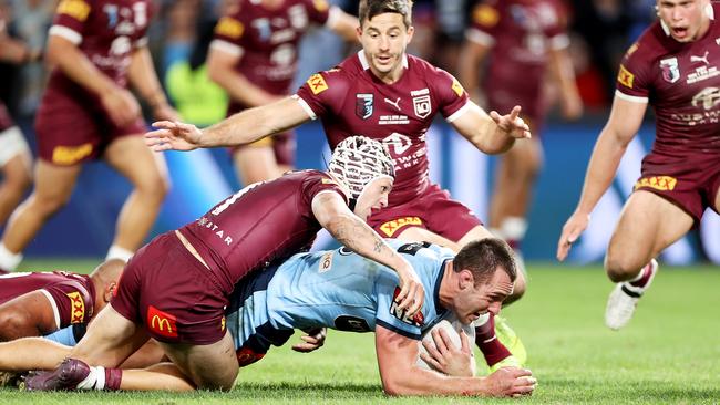 Isaah Yeo of the Blues is tackled in the last play of the match during game one. Picture: Mark Kolbe/Getty