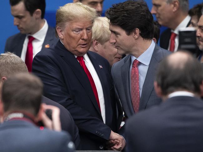 Donald Trump, with Justin Trudeau, announced that they had agreed to close the US and Canada border to all but essential travel. Picture: Getty Images