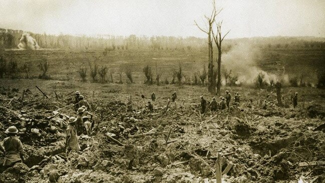 Sappers clear ground at Messines just yards behind the fighting. (see the smoke)