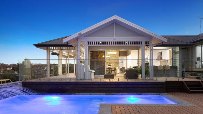 Sold $3m: 35 Oxley Rise, Batesford features a 7-bedroom home with panoramic views that's designed for multi-generational living. Outdoor areas include a covered barbecue area with electronic louvres, a heated pool and another space geared for outoor movie nights.