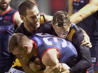 19/05/17 - SANFL: Norwood versus Glenelg at Norwood Oval. Glenelg's Warrick McGinty and Dominic Barry wrap up Norwood's Matthew Fuller. Picture Dean Martin