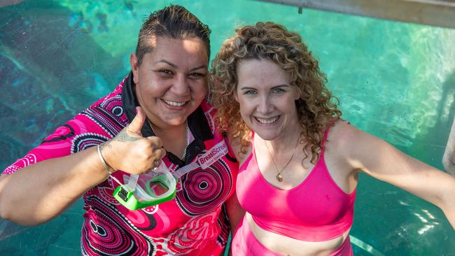 NT Breast Cancer Voice representative Natalie Stokes and Breast cancer survivor Belinda Kolstad entering the cage of death at the Crocosaurus Cove, Darwin. Picture: Pema Tamang Pakhrin