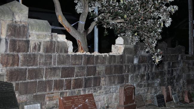 The male driver crashed through a sandstone wall at Randwick Cemetery. Picture: Bill Hearne