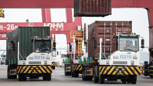 The delays at ports and airports will mean delays for online orders and gaps on Aussie shelves. Picture: Wang He/Getty Images