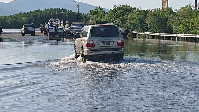 Water has flooded over the road at Trawler Base Rd, Portsmith due to king tides affecting the Cairns area. PICTURE: Anna Rogers