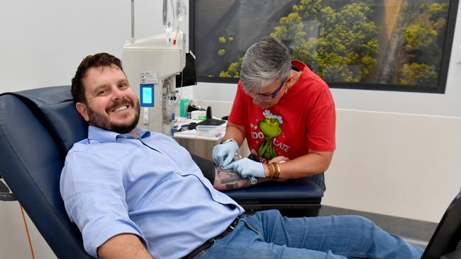 Herbert MP Phillip Thompson rolls up his sleeve for the Christmas Blood Blitz, with help from RN Angela Simon at the Townsville Life Blood Centre. Picture: Evan Morgan