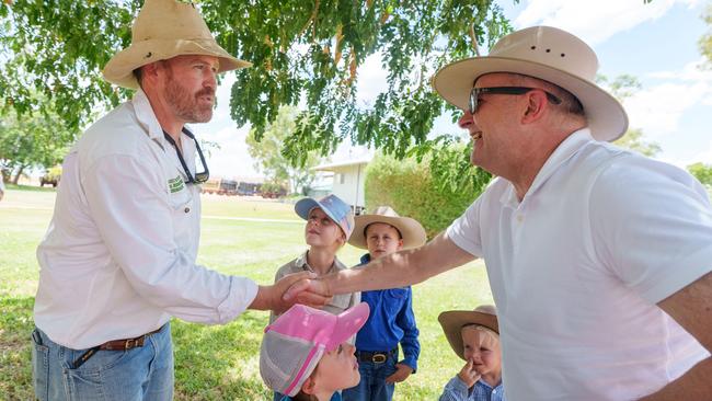 Mr Albanese shakes hands with Lake Nash station manager Eric Gibson. Picture: PMO