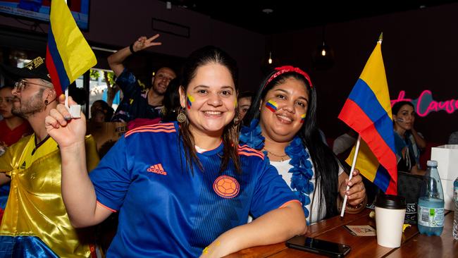 Lina Hurtado and Jessi Giraldo as Boisterous Colombian supporters watching their national side take on Argentina in the 2024 Copa America Final at the Lost Arc, Darwin. Picture: Pema Tamang Pakhrin.