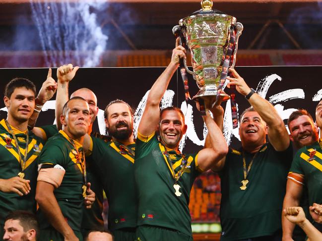 (FILES) This file photo taken on December 2, 2017 shows Australia celebrating their victory in the Rugby League World Cup men's final match between Australia and England in Brisbane. - Australia and New Zealand pulled out of the 2021 Rugby World Cup in England on July 22, 2021 citing "player welfare and safety" concerns during the Covid-19 pandemic. (Photo by Patrick HAMILTON / AFP) / --IMAGE RESTRICTED TO EDITORIAL USE - STRICTLY NO COMMERCIAL USE--