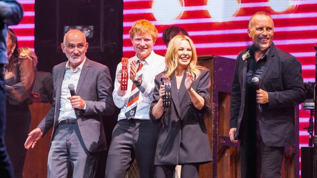 Performers at a strange and unforgettable night in 2021 for Michael Gudinski’s state memorial service at Rod Laver Arena. L-R: Paul Kelly, Ed Sheeran, Kylie Minogue and Mark Seymour. Picture: Mushroom Creative House