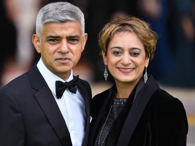 London Mayor Sadiq Khan (L) and his wife Saadiya Khanarrive for the ceremony. Picture: AFP.