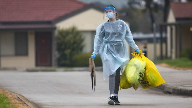 Clinical waste bags from St Basil’s are emptied by a staffer at the site. Picture: Sarah Matray