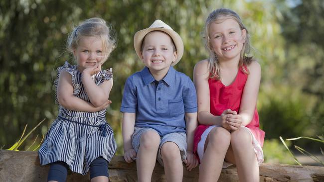 Ned Isham, 5, with sisters Eleanor, 2, and Lucy, 9. Picture: Jason Edwards