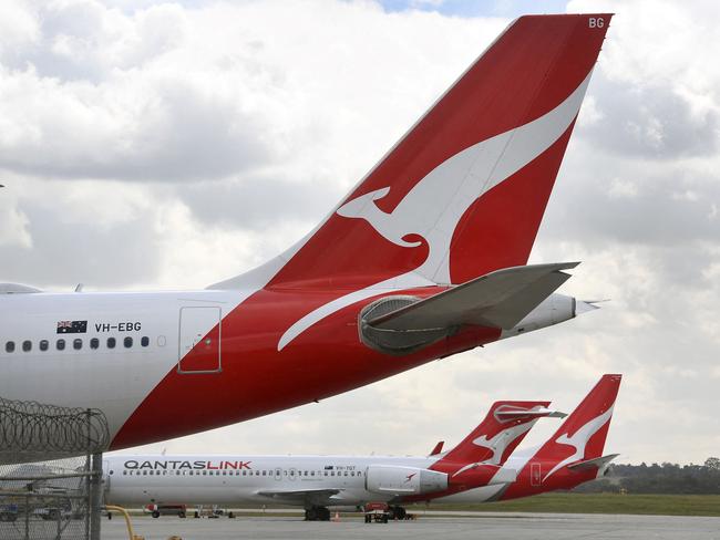 Qantas planes sit idle at Melbourne Airport on August 26, 2021 as Australian airline Qantas posted more than 1 billion USD in annual losses, after what it described as a 