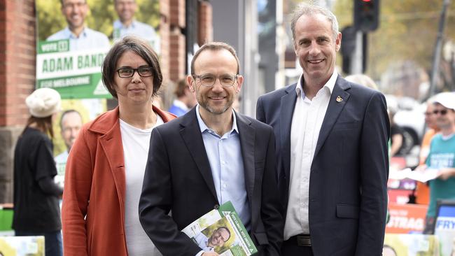 MELBOURNE, AUSTRALIA - NewsWire Photos MAY 12, 2022: Greens leader Adam Bandt, Celeste Liddle, Greens candidate for Cooper and Immigration spokesman Nick McKim at a pre-polling station in Abbotsford in inner Melbourne. Picture: NCA NewsWire / Andrew Henshaw