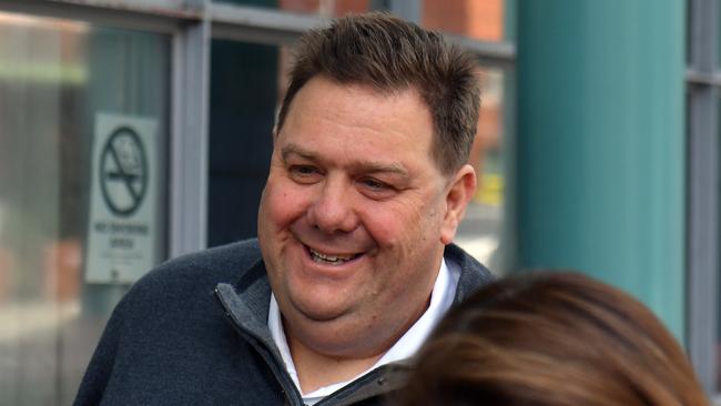 Former teacher Simon William Phillips leaves the Burwood Local Court on Wednesday.