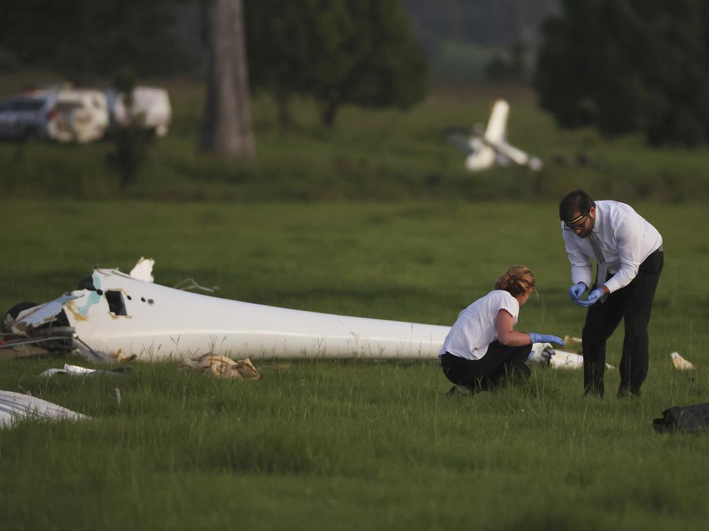 Investigators at the crash site on Wednesday. Picture: Lachie Millard