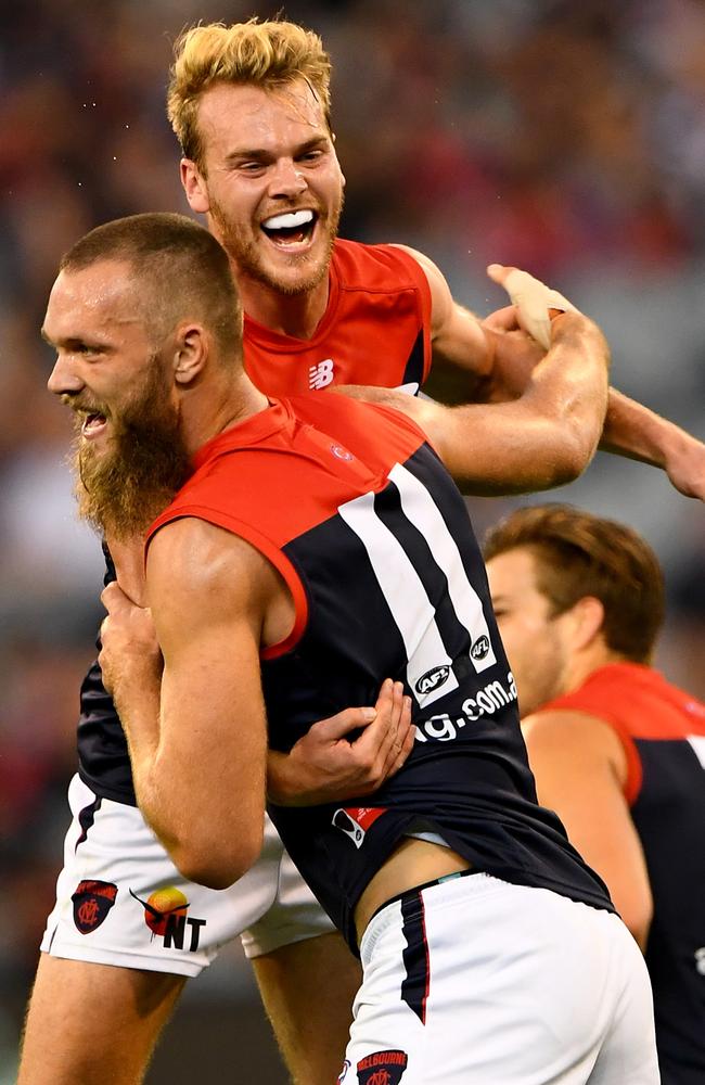 Jack Watts and Max Gawn celebrate a goal against Collingwood on Sunday. Picture: Getty Images