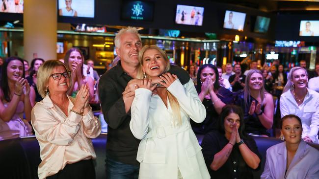 Shyla and Shane Heal celebrate after the Aussie guard was announced as eighth pick of the 2021 WNBA draft. Picture: News Corp Australia