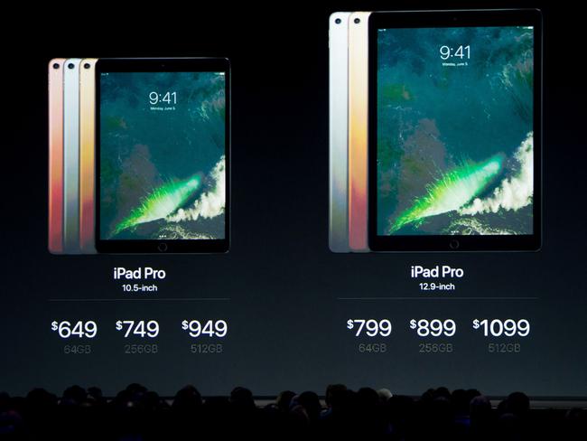 Prices for the new iPad Pro models are shown on stage during Apple's World Wide Developers Conference. Picture: Josh Edelson