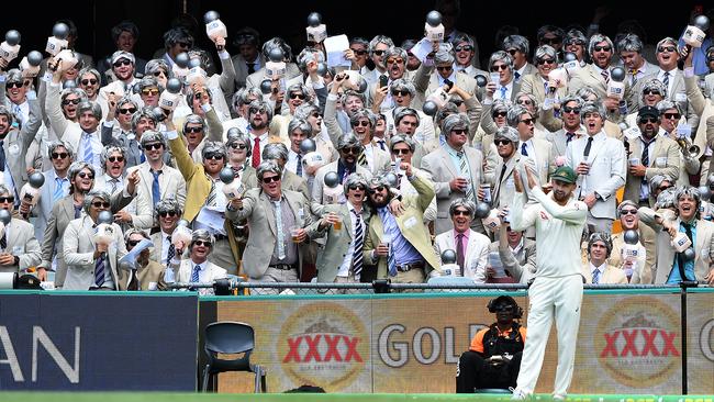 Nathan Lyon applauds the support from ‘The Richies’ in Brisbane.