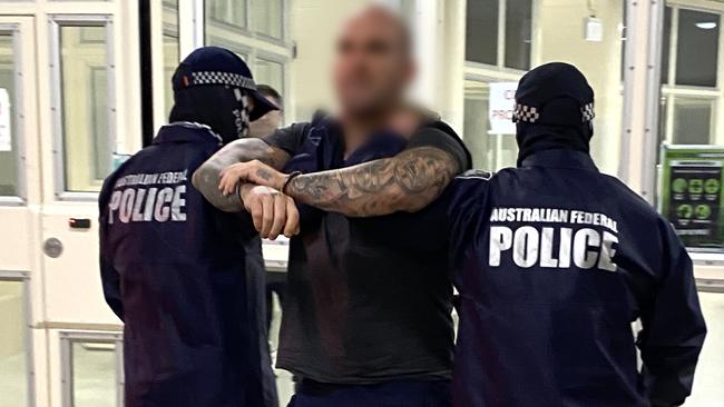 Buddle was returned to Australia on Wednesday morning and immediately taken into custody by the AFP. Picture: Australian Federal Police