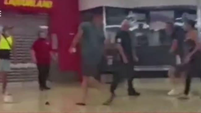 A man allegedly attacks a security guard and stabs another shopper after being asked to wear a face mask in shopping centre in Windsor. Picture: Channel 7 News