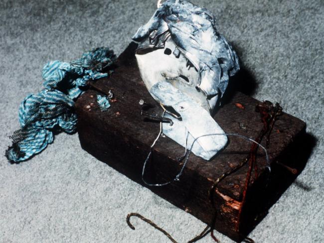 Part of the timing device used in the Russell St bombing made with part of a fence post, clock and rubbish bin handle. Picture: HWT library.