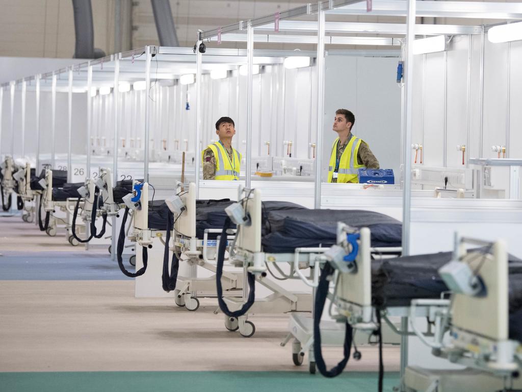 Soldiers and private contractors have worked to prepare the two wards, which are close to the open air morgue which has been hastily prepared. Picture: Stefan Rousseau – WPA Pool/Getty Images