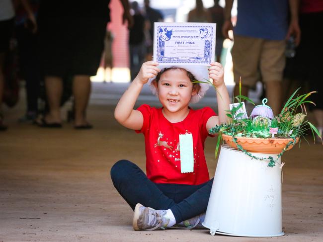 Rosanna Siriotis, 6, a winner in the Horticulture section ,enjoying day two of the Royal Darwin Show. Picture: Glenn Campbell