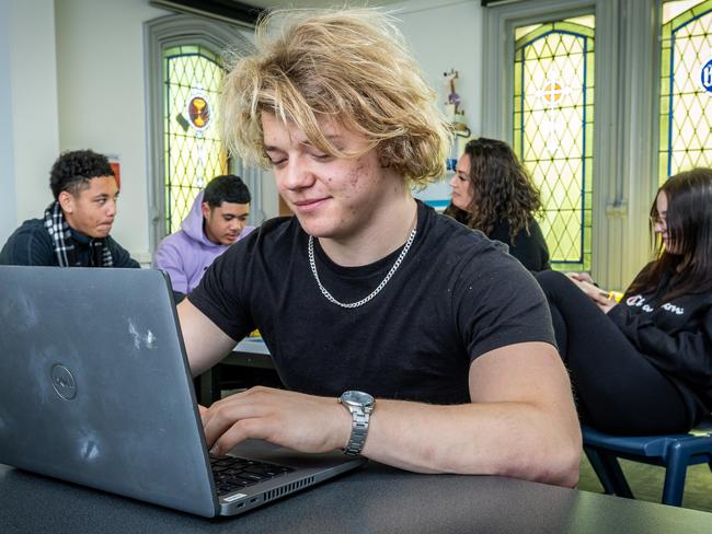 The school provides laptops to its students, including Marley, who is planning to open a small business on campus. Picture: Jake Nowakowski