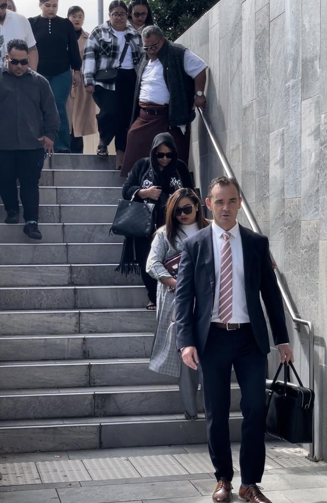 Tauvela Soe's family and defence lawyer Troy Smith leaving Beenleigh Magistrates Court