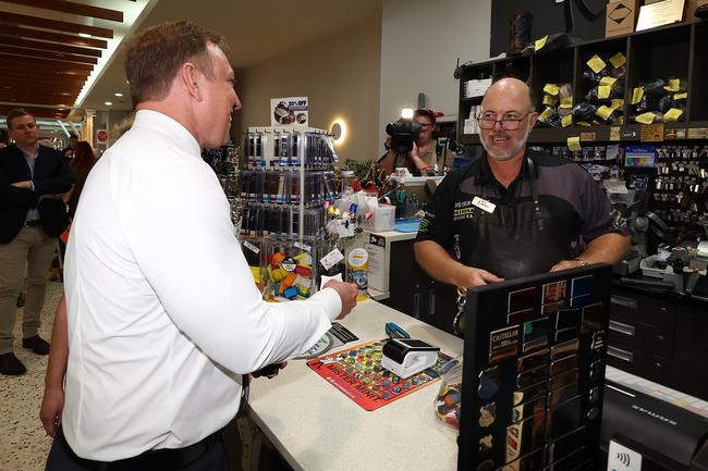 Queensland State Election coverage with the Queensland Premier Steven Miles. Steven visits Caneland Central where Scott Mauchline from Mister Minit cleans the Premiers shoes. Pics Adam Head