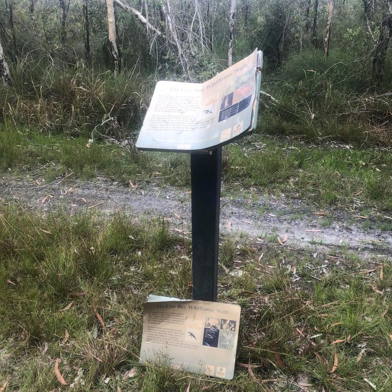 The Tin Can Bay vandals ripped off the bird information signs and other signs off their posts, while also graffitiing on other community property including a public seat. Pictures: Daryll McLaren.