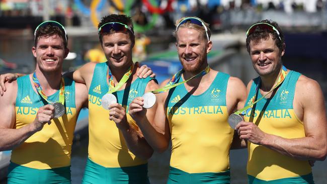 James McRae (far left) with his team after winning the silver medal in the Men's Quadruple Sculls Final A on Day 6 of the Rio 2016 Olympic Games. Picture: Alexander Hassenstein/Getty Images