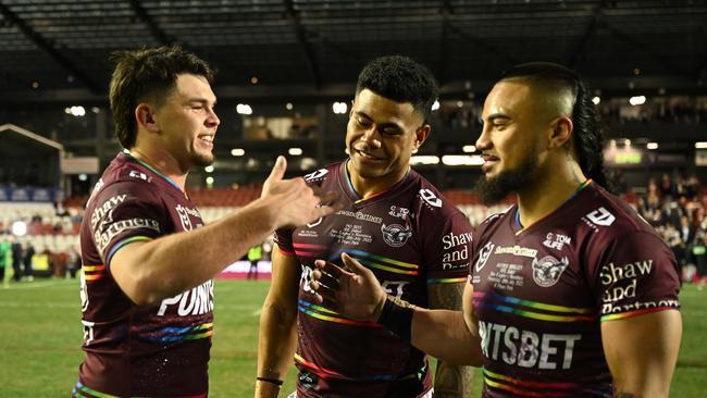 (L-R) Manly rookies Zac Fulton, Pio Seci, Alfred Smalley wore the jersey with pride as they celebrated their NRL debuts. Picture: NRL Photos.