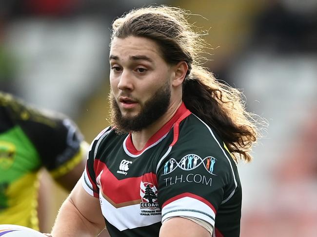 LEIGH, ENGLAND - OCTOBER 30: Khaled Rajab of Lebanon breaks with the ball during Rugby League World Cup 2021 Pool C match between Lebanon and Jamaica at Leigh Sports Village on October 30, 2022 in Leigh, England. (Photo by Gareth Copley/Getty Images)