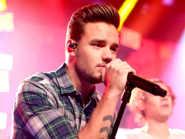 FILE - OCTOBER 16: Singer Liam Payne, a former member of One Direction, died after falling from a hotel in Buenos Aires, Argentina. He was 31 years old. BURBANK, CA - NOVEMBER 22:  Musician Liam Payne performs onstage at the "One Direction iHeartRadio Album Release Party" hosted by Ryan Seacrest at the iHeartRadio Theater Los Angeles Ãâ Clear Channel's new music and events venue located at The Burbank Studios in Burbank, CA  (Photo by Christopher Polk/Getty Images for Clear Channel)