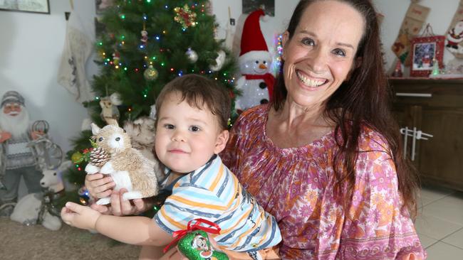 Ms  Brigit Daymond  and her 2 year old  grandson Lincoln Tawhara getting set for the Launch of the Christmas lights competition at her Nerang Home. Picture: Mike Batterham