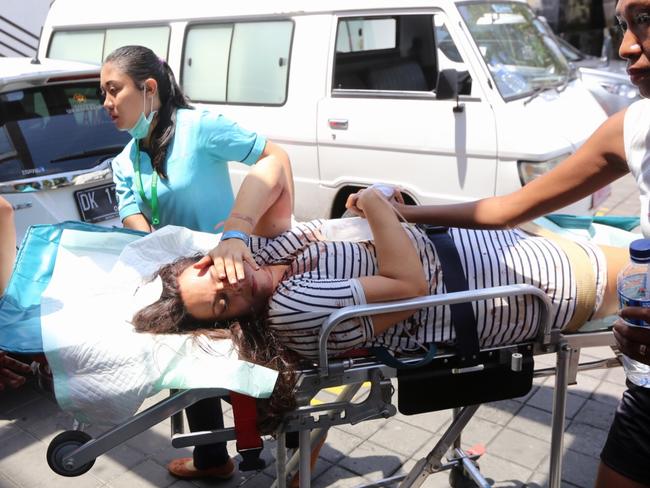 Sara Isabel Galdeano Vili, also from Spain, is being taken to ambulance after being hurt in the explosion on board the Gili Cat 2 fast boat in Bali. Picture: Lukman S. Bintoro