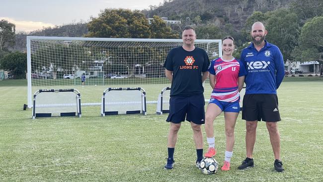 Lions FC coach Warren Moon with Brothers senior player Lily Falvey, 17, and Brothers football director Jeremy Brockie. Picture: Nic Darveniza