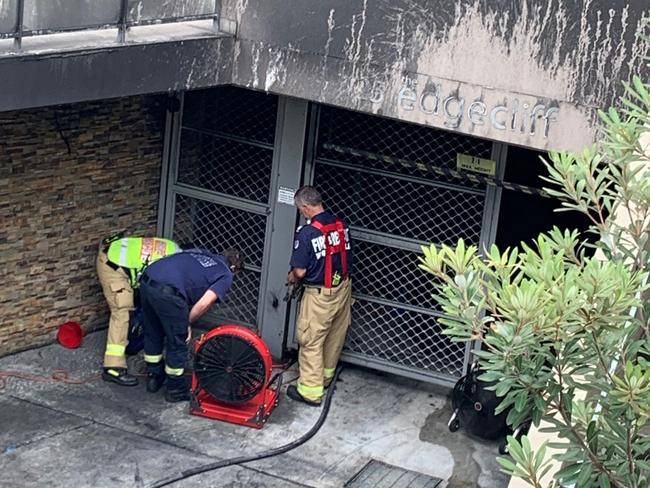 NSW Fire and Rescue personnel work to ventilate hazardous smoke from the car park under the block of units in Delmar Pde, Dee Why. Picture: Supplied