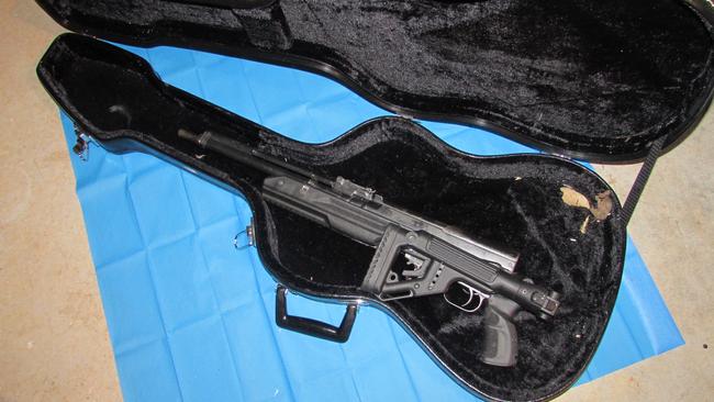 The assault rifle was found in a guitar case in Bentley’s garage.