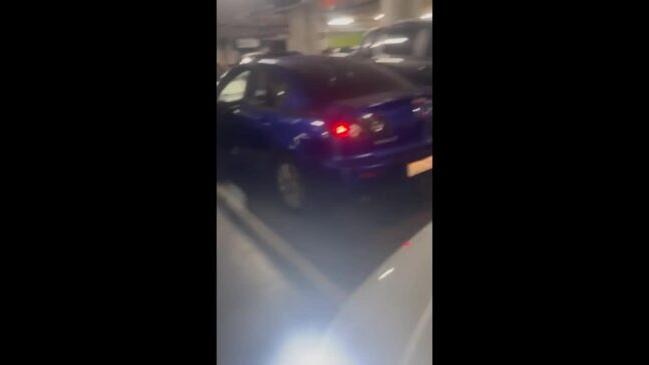 Woman was hit by a car in parking lot after altercation