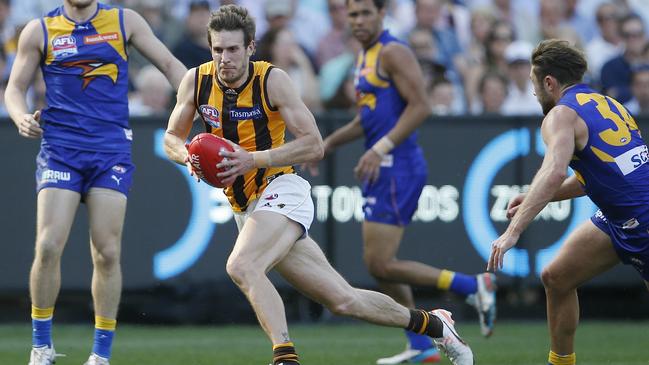 2015 AFL Grand Final. Hawthorn vs. West Coast Eagles at the MCG. Hawthorns Grant Birchall gets out of trouble. Picture: Michael Klein.