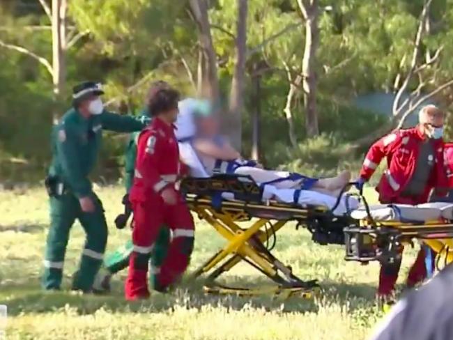 A 15-year-old has been airlifted to hospital after a gas cylinder blew up in his face. Pictures: 9 News,