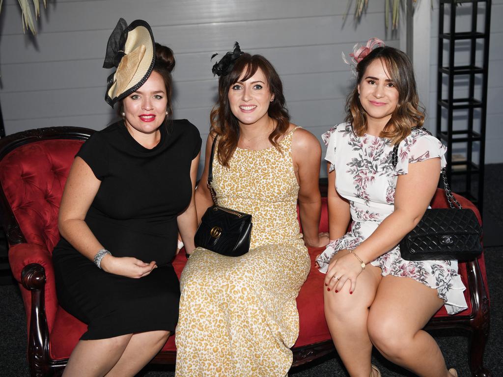 Stephanie Vale, Anna Whelan and Cecile Signoret at the Darwin Turf Club Bridge Toyota Ladies' Day / Derby Day. Picture: KATRINA BRIDGEFORD